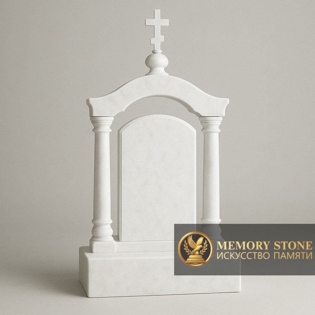 белоснежный памятник с колоннами и православным распятием на навершии