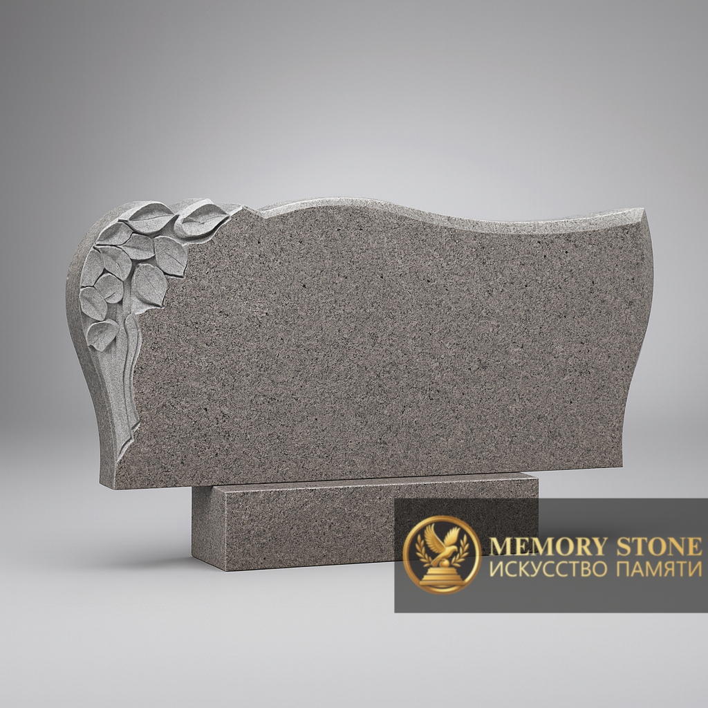  Широкое двойное надгробие из светлого камня с деликатным цветочным барельефом в углу