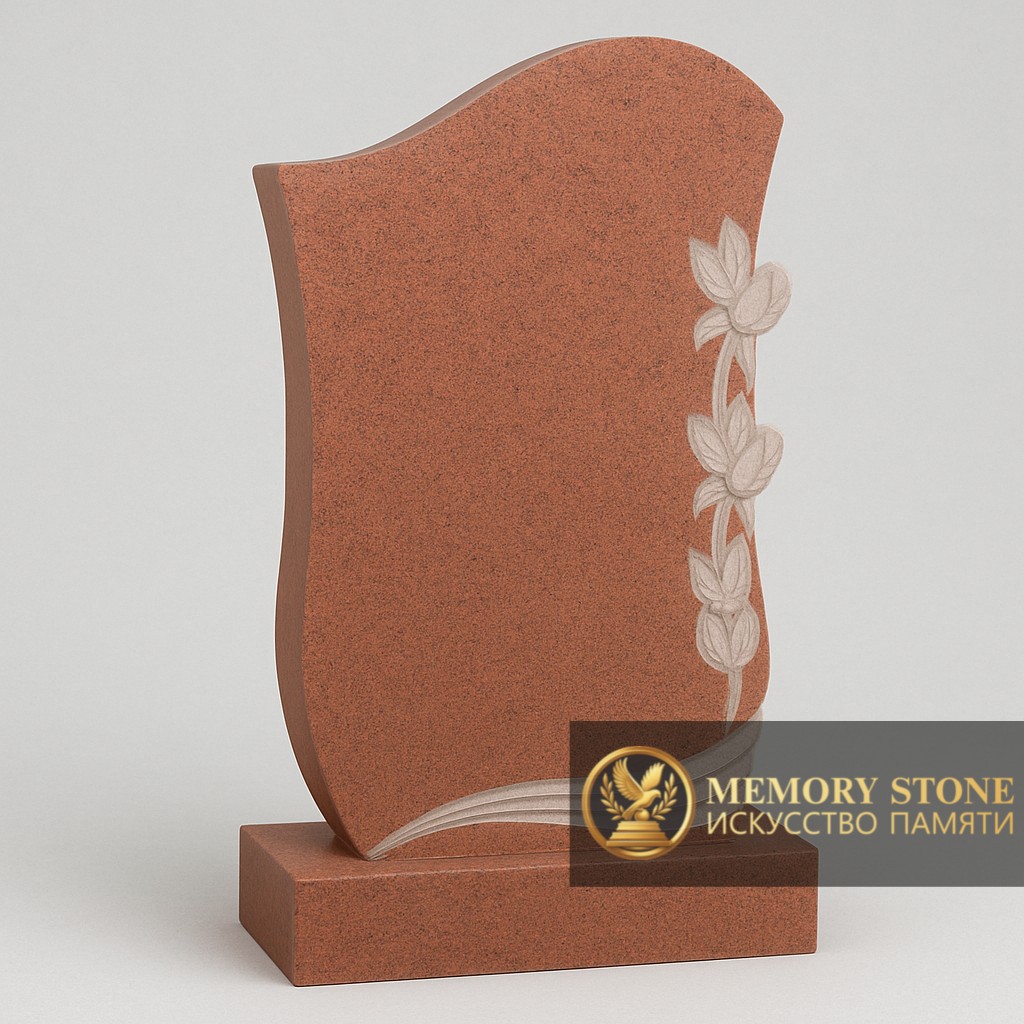 красный вертикальный памятник с барельефом цветов на боковой грани