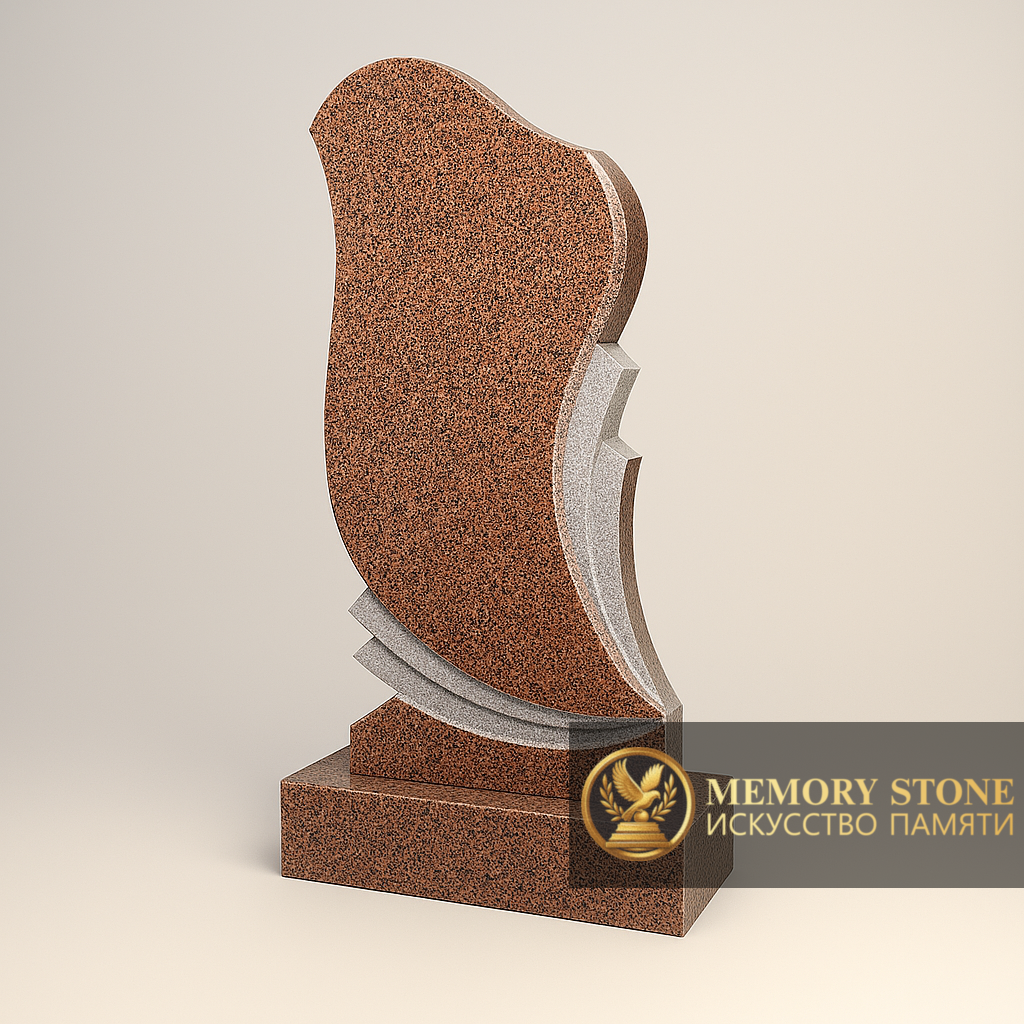 вертикальный памятник красного цвета с резными линиями в виде огня