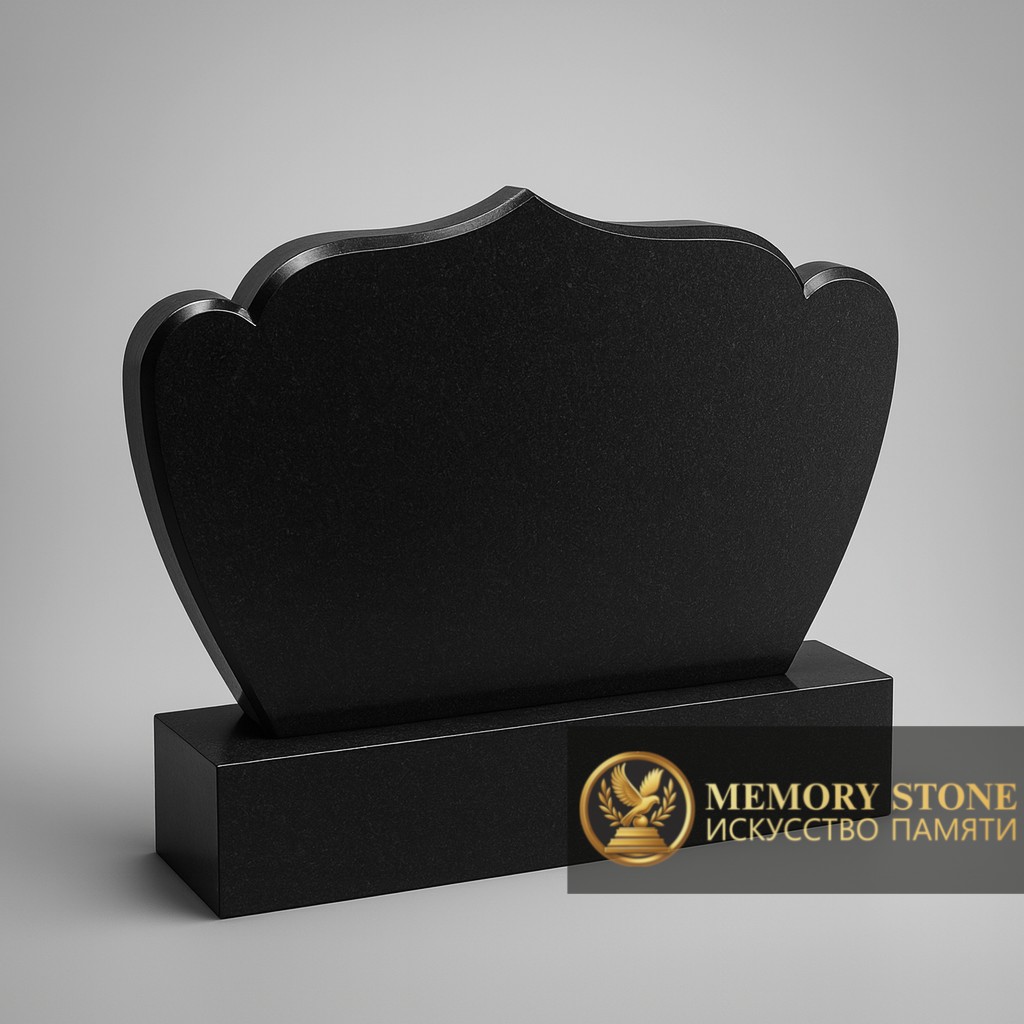 Строгий памятник черного цвета с плавным фигурным завершением верхней грани